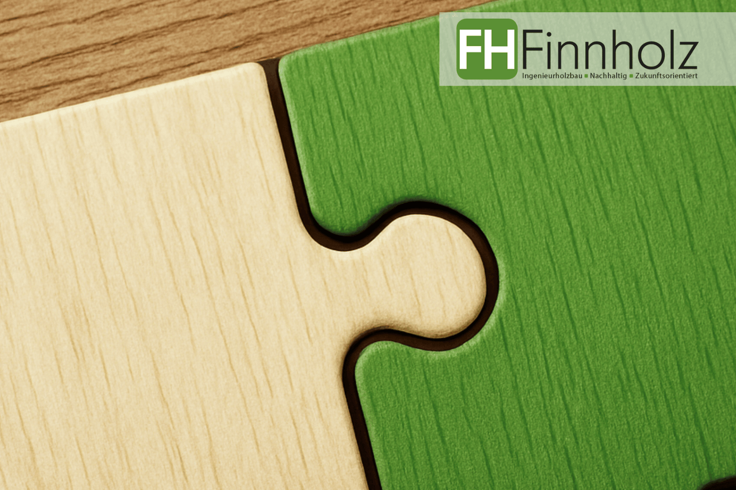 Das Bild zeigt zwei Puzzlestücke, die ineinandergreifen. Es dient als Verbildlichung der Partnerschaft zwischen dem Interessenten und FH Finnholz, wenn es um den Neubau einer Sporthalle geht.